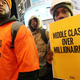 Workers attend an economic rally in December 2012. (Mario Tama/Getty Images)